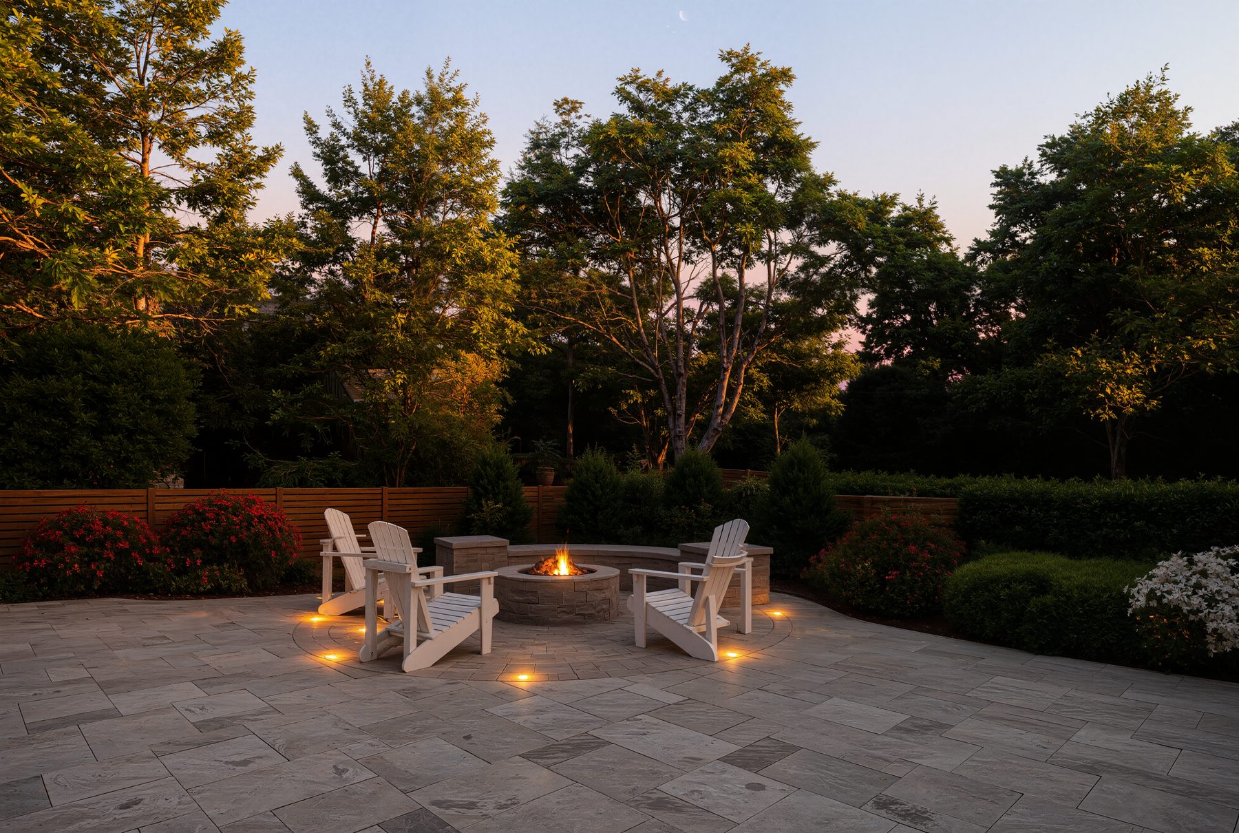 3D rendering of a dusk patio with fire pit, chairs and lanterns